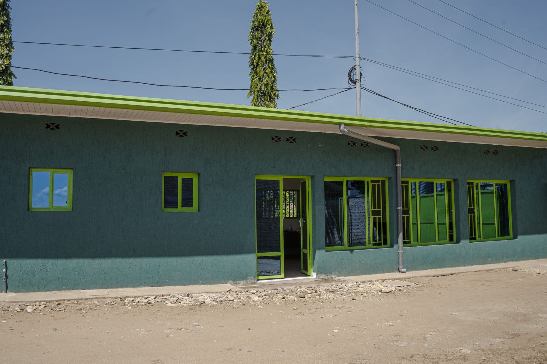 Exterior of the green-trimmed Orora Agro Group facility at the Ex-ALCOVIT industrial site in Bujumbura